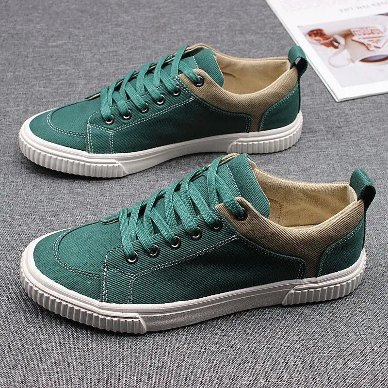 Mens Spring Canvas Shoes Breathable Lace Up Casual Mens Versatile Flat Bottomed Cloth Shoes Anti Skateboard Shoes Tenis 240612