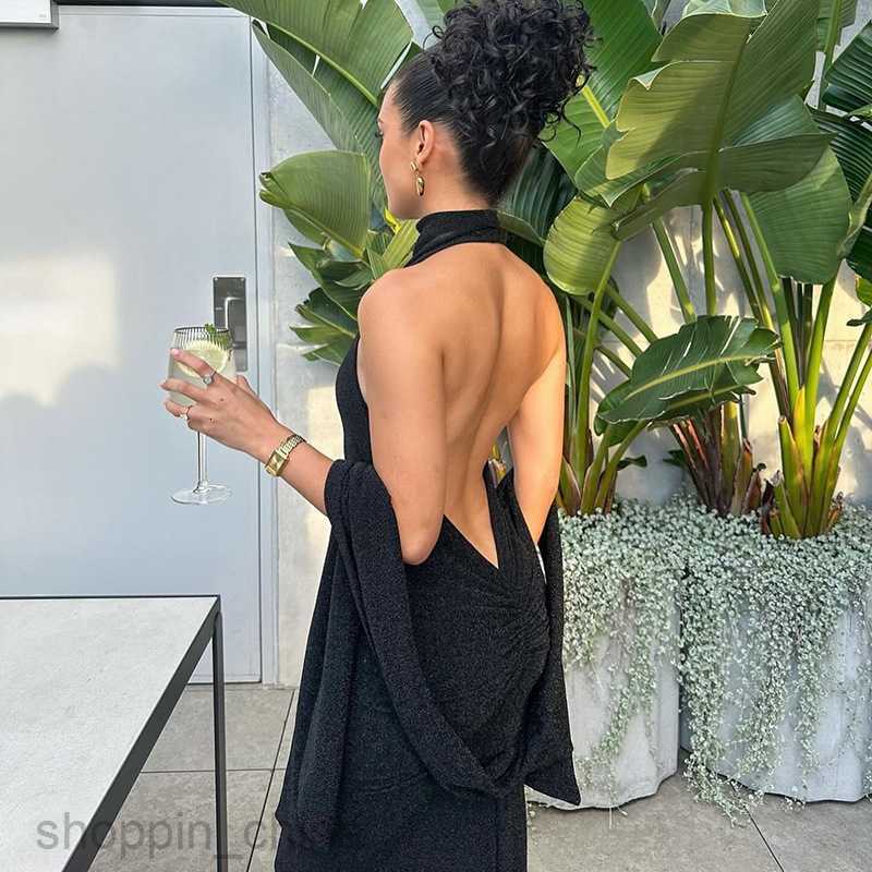 Basic Casual Dresses Fashionable temperament new sexy large piece backless hanging neck slim fitting patchwork long sleeves and shiny silk dress