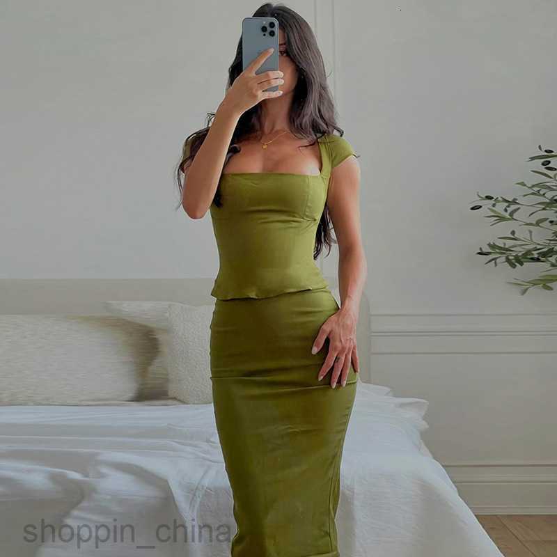 Two Piece Dress Sets Feng Spring New Casual Solid Color Short sleeved Top Close Fit and Hip Wrap Middle Style Skirt Set for Women