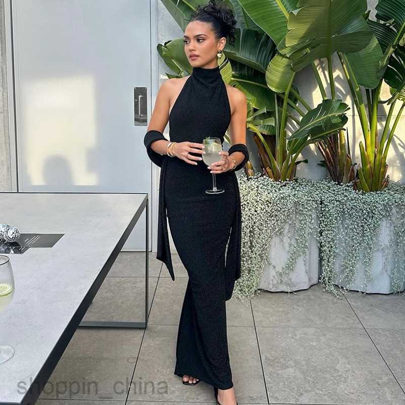 Basic Casual Dresses Fashionable temperament new sexy large piece backless hanging neck slim fitting patchwork long sleeves and shiny silk dress