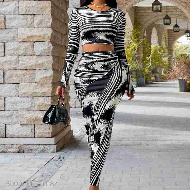 Two Piece Dress Sets Autumn and Winter New Fashion Women's Wear Printed Round Neck Long Sleeve waist Slim Set