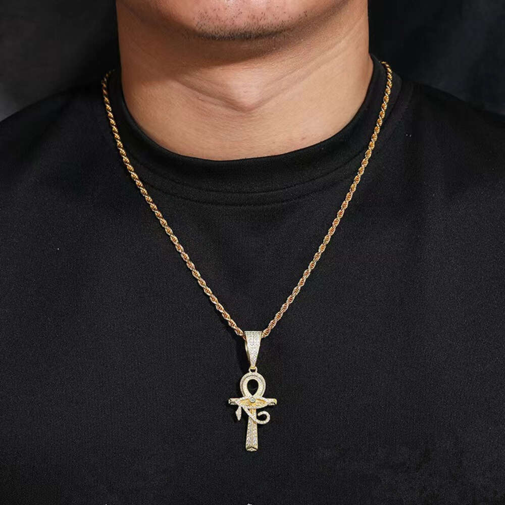 Pendant necklace, jewelry designer Eye of Horus cross moissanite pendant and sterling sier rope social gathering super face