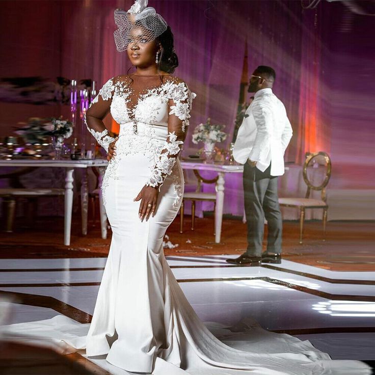 Elegant African Satin Mermaid Wedding Dresses With Illusion Skin Long Sleeves Lace Appliques Ivory Bridal Gowns Court Train Sheer Jewel Neck 2024 Vest