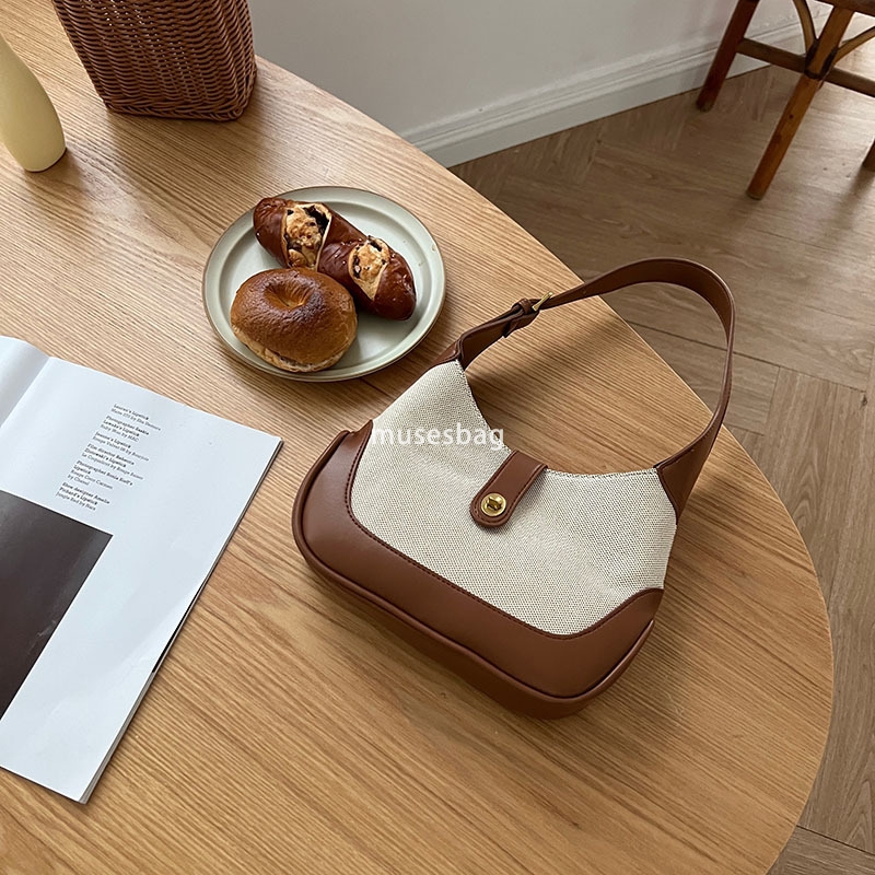 Advanced two-color patchwork retro canvas bag for commuting portable single shoulder underarm bag contrasting color handbag high-quality law stick bag