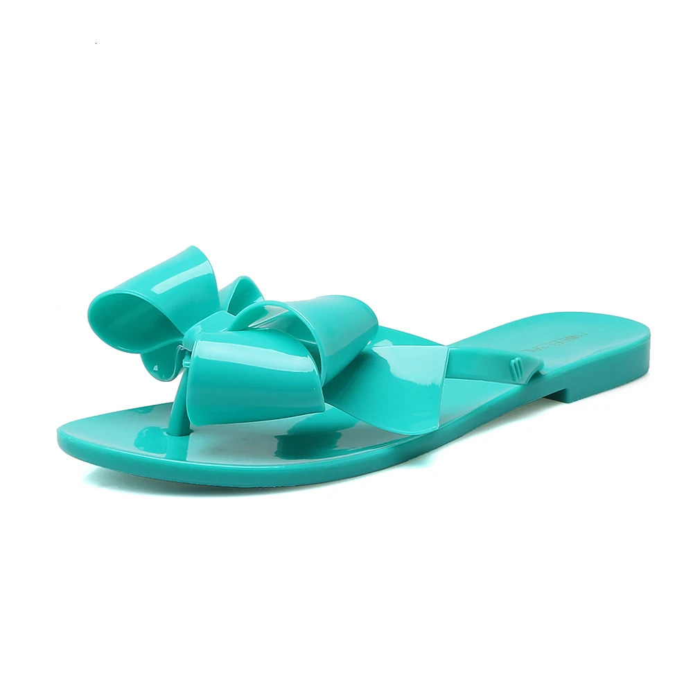 Shiny bow toe clip jelly sandals womens skates womens sweet fairy shoes rain proof flat sandals 240612