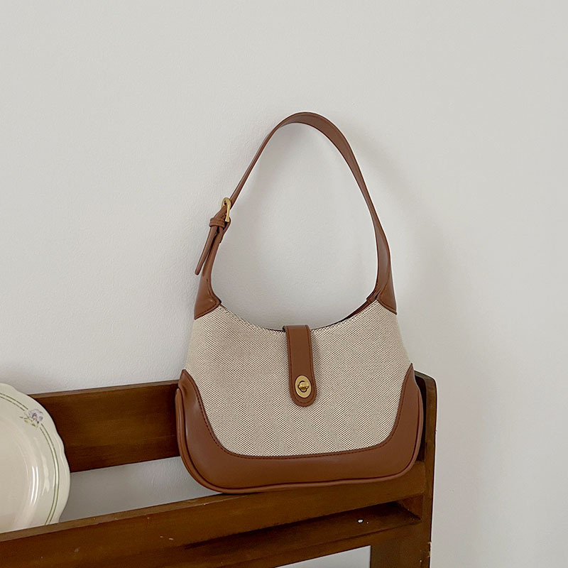 Advanced two-color patchwork retro canvas bag for commuting portable single shoulder underarm bag contrasting color handbag high-quality law stick bag