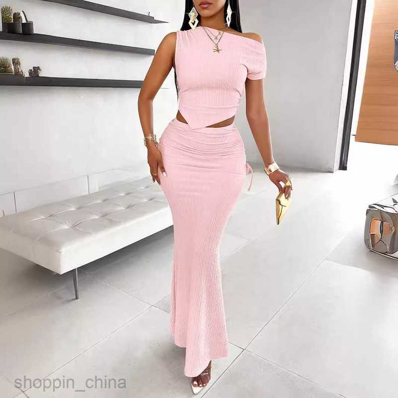 Two Piece Dress Sets Summer women's clothing new solid color single shoulder top waist cinched pleated long skirt set