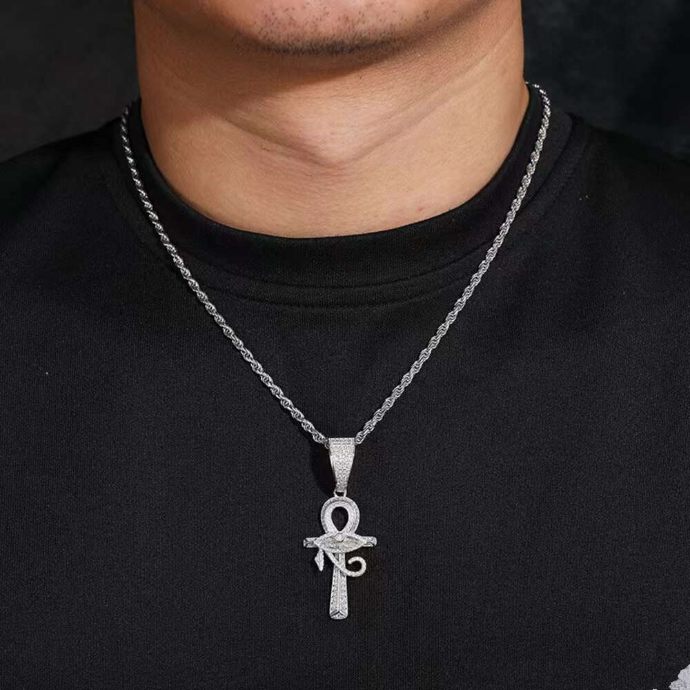 Pendant necklace, jewelry designer Eye of Horus cross moissanite pendant and sterling sier rope social gathering super face