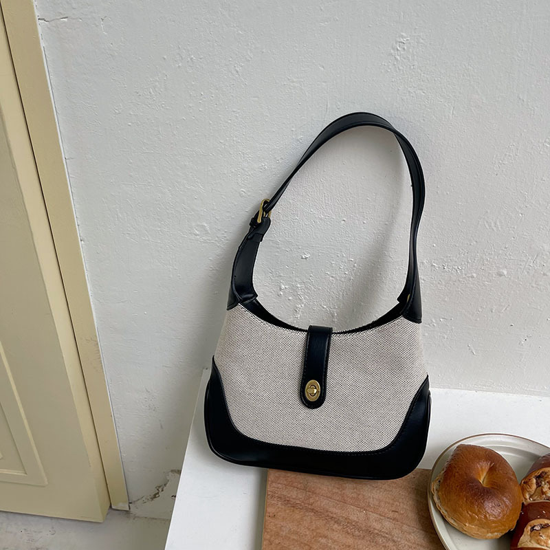 Advanced two-color patchwork retro canvas bag for commuting portable single shoulder underarm bag contrasting color handbag high-quality law stick bag