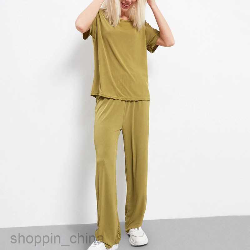 Women's Tracksuits Casual and fashionable short sleeved long pants set Russian solid color for women's summer wear Sets