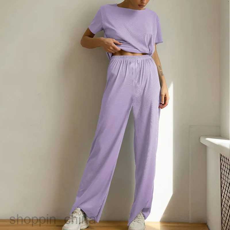Women's Tracksuits Casual and fashionable short sleeved long pants set Russian solid color for women's summer wear Sets