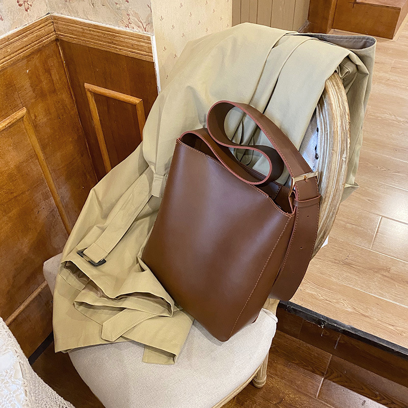 European and American Retro Bag PU Women's New Tote Bucket Bag Wide Shoulder Strap Fashion Versatile One Shoulder Handheld Crossbody Solid Color 