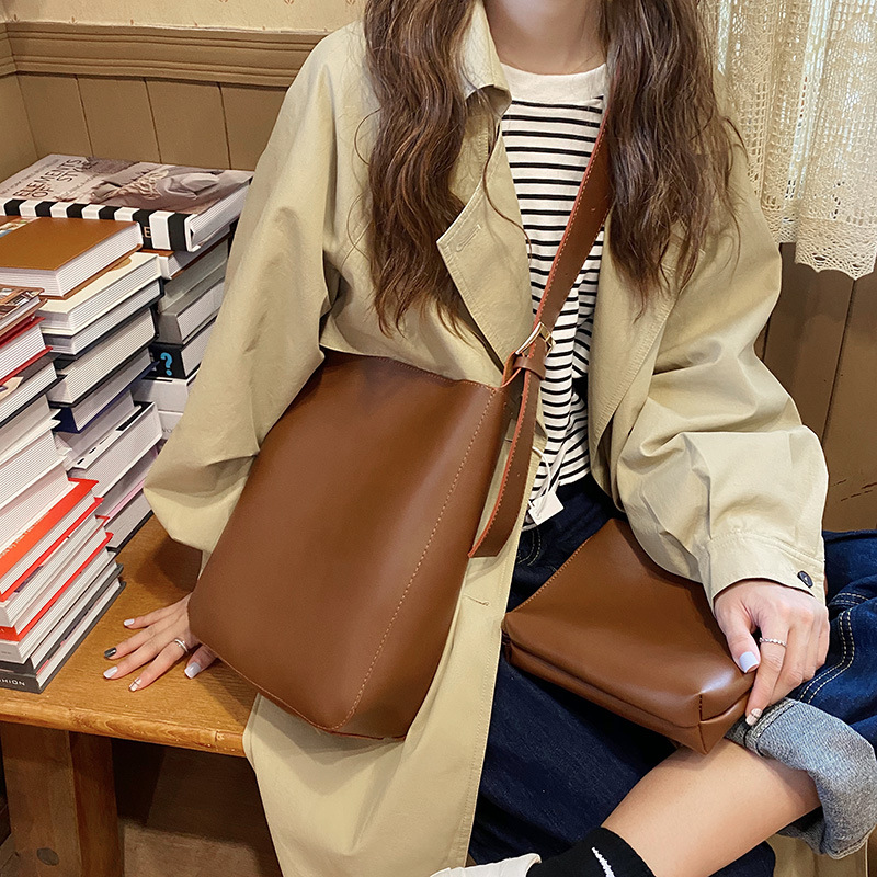 European and American Retro Bag PU Women's New Tote Bucket Bag Wide Shoulder Strap Fashion Versatile One Shoulder Handheld Crossbody Solid Color 