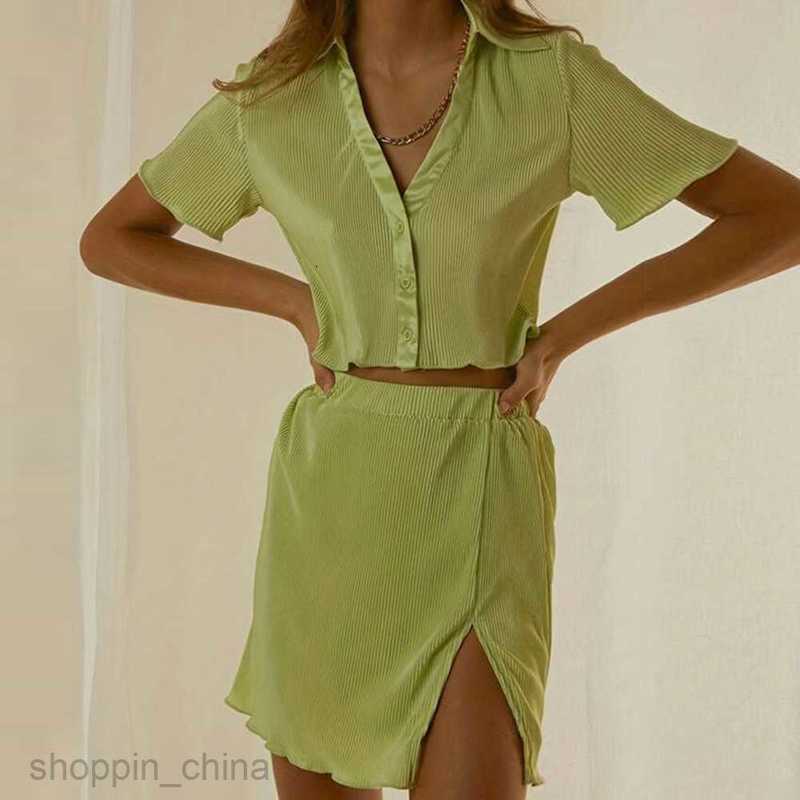 Two Piece Dress Sets New temperament exposed navel short sleeved top slim slit half skirt set for women PG310
