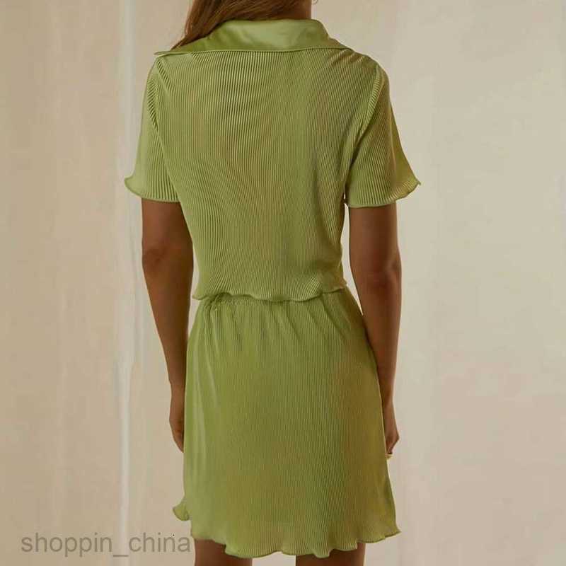 Two Piece Dress Sets New temperament exposed navel short sleeved top slim slit half skirt set for women PG310