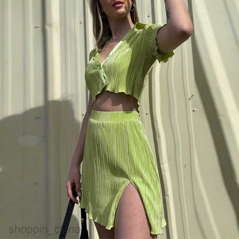 Two Piece Dress Sets New temperament exposed navel short sleeved top slim slit half skirt set for women PG310