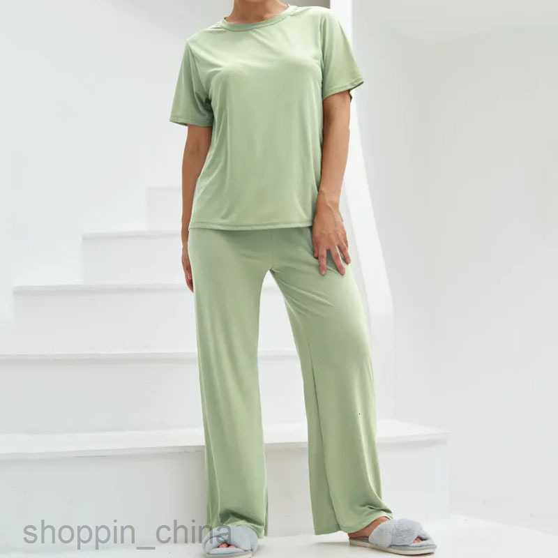 Women's Tracksuits Casual and fashionable short sleeved long pants set Russian solid color for women's summer wear Sets