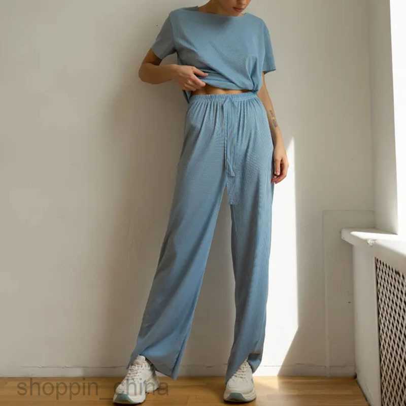 Women's Tracksuits Casual and fashionable short sleeved long pants set Russian solid color for women's summer wear Sets