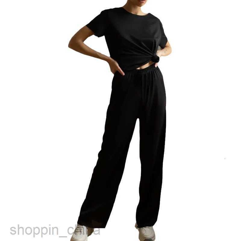 Women's Tracksuits Casual and fashionable short sleeved long pants set Russian solid color for women's summer wear Sets