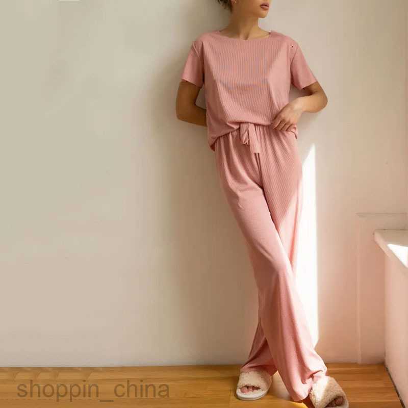Women's Tracksuits Casual and fashionable short sleeved long pants set Russian solid color for women's summer wear Sets