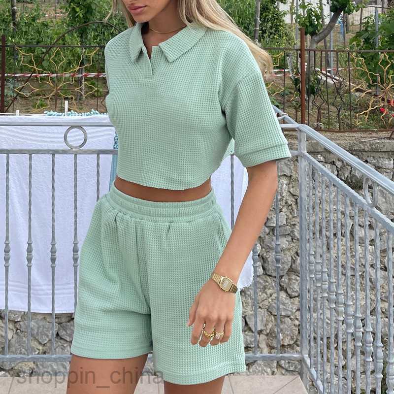 Women's Tracksuits New casual V-neck zippered short sleeved top and shorts, solid color sports two-piece set for girls Sets