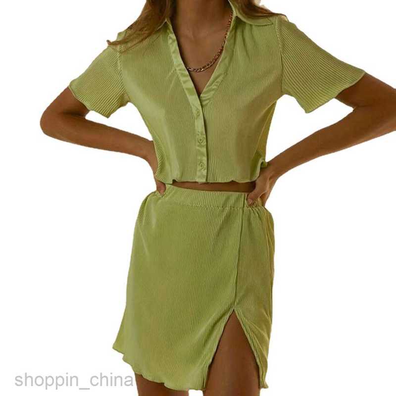 Two Piece Dress Sets New temperament exposed navel short sleeved top slim slit half skirt set for women PG310