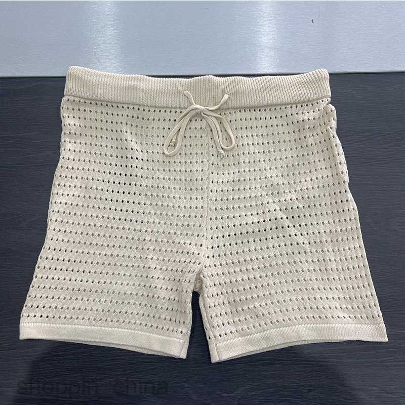 Women's Tracksuits New casual short sleeved V-neck hollowed out shirt shorts, solid color sports two-piece set for girls Sets