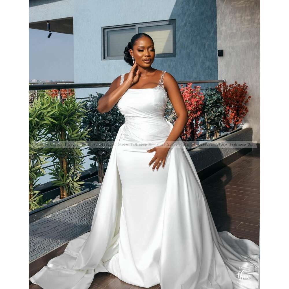 Neat White Mermaid special Dresses with Detachable Train Sheer Neck Sleeveless Beading Illusion African Garden Hotel Bridal Gown