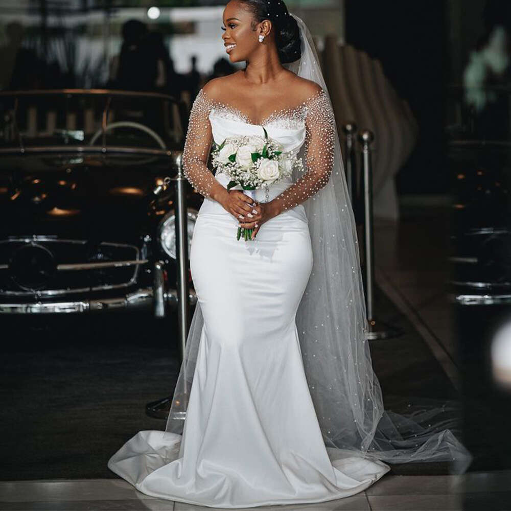 New Africa Mermaid special Dresses with Detachable Train 2024 Sheer Neck Long Sleeve Satin Beading Crystal Bridal Gowns