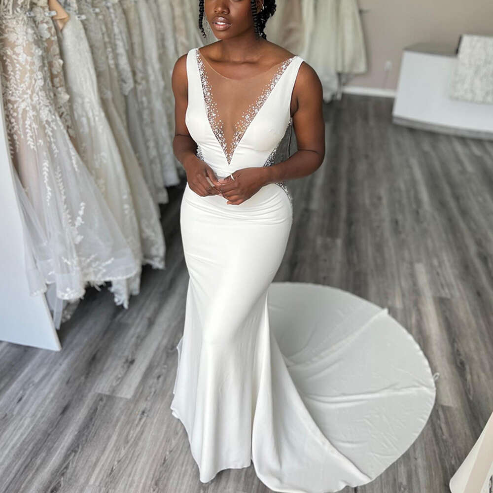 Stunning Mermaid Wedding Dresses for Bride Sheer Neck Sleeveless Sweep Train See Through Beads African Beach Garden Bridal Gowns