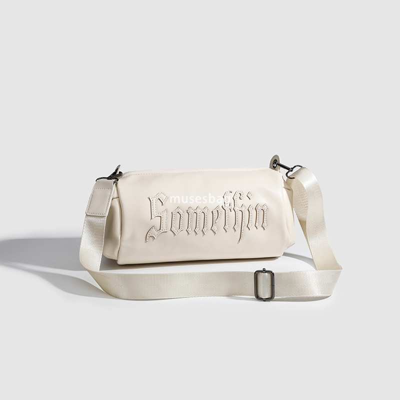 Small group Gothic letter embroidered casual solid color crossbody cylinder bag for women's new single shoulder crossbody bag trend