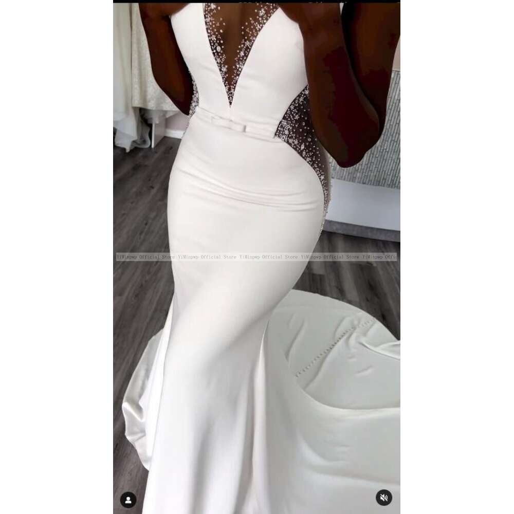 Stunning Mermaid Wedding Dresses for Bride Sheer Neck Sleeveless Sweep Train See Through Beads African Beach Garden Bridal Gowns