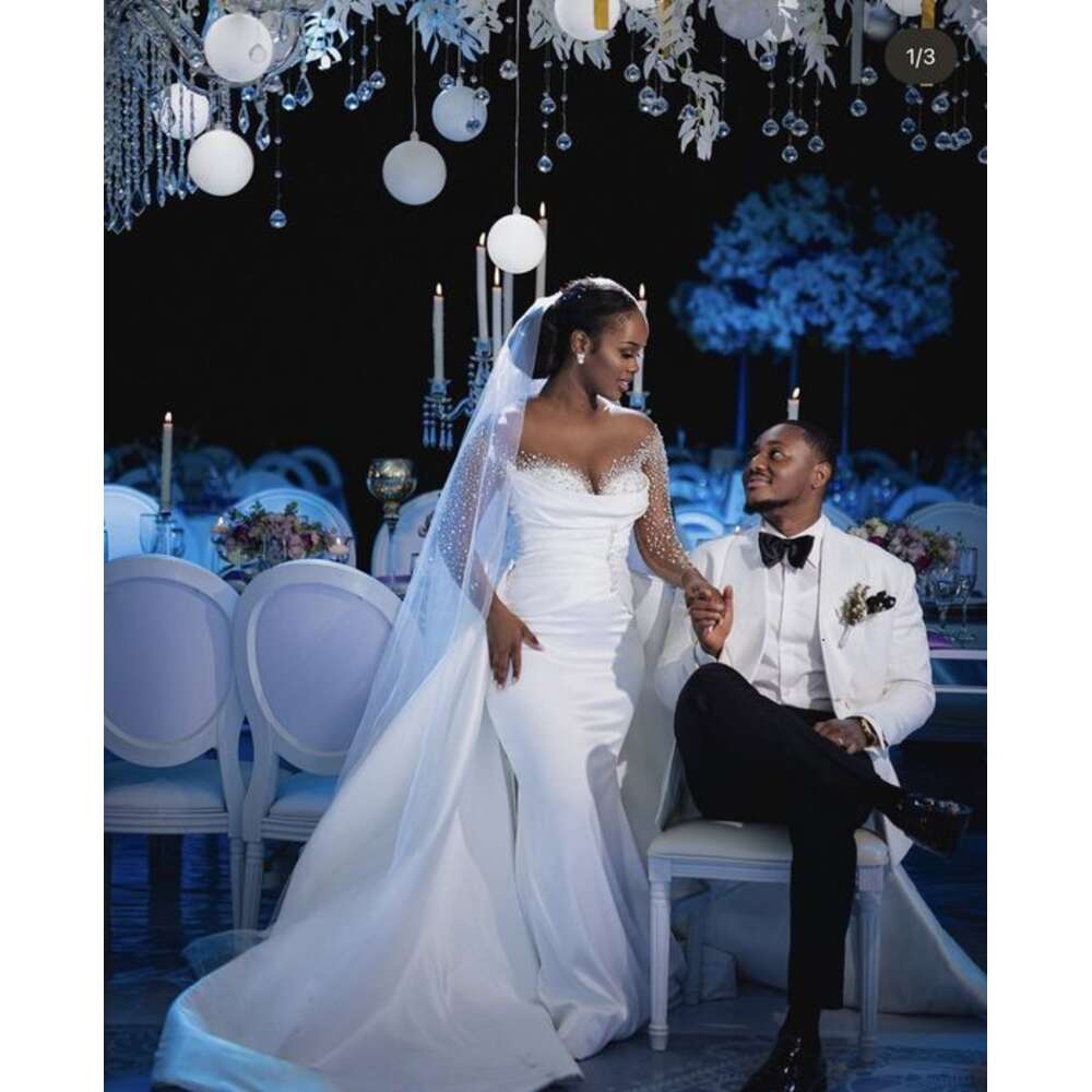 New Africa Mermaid special Dresses with Detachable Train 2024 Sheer Neck Long Sleeve Satin Beading Crystal Bridal Gowns