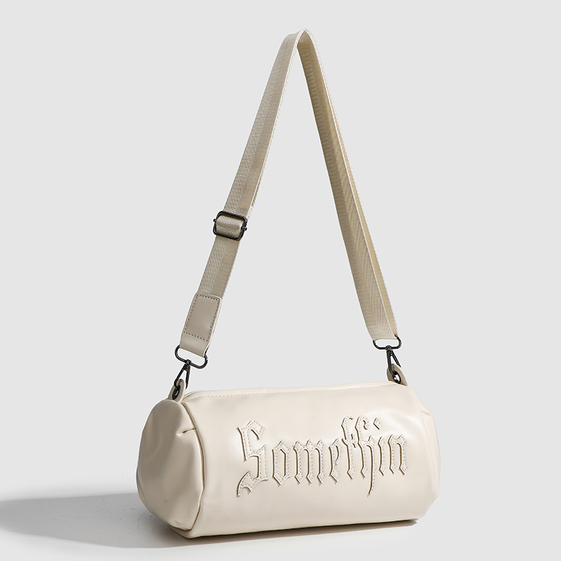 Small group Gothic letter embroidered casual solid color crossbody cylinder bag for women's new single shoulder crossbody bag trend