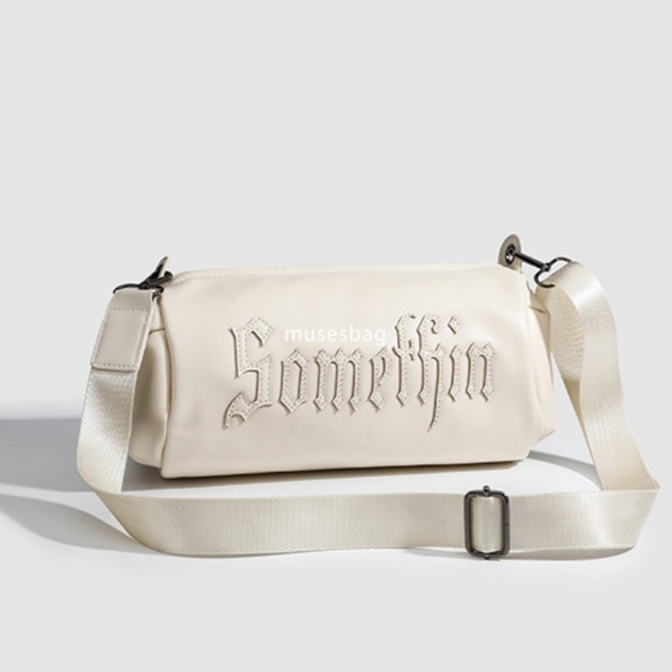 Small group Gothic letter embroidered casual solid color crossbody cylinder bag for women's new single shoulder crossbody bag trend