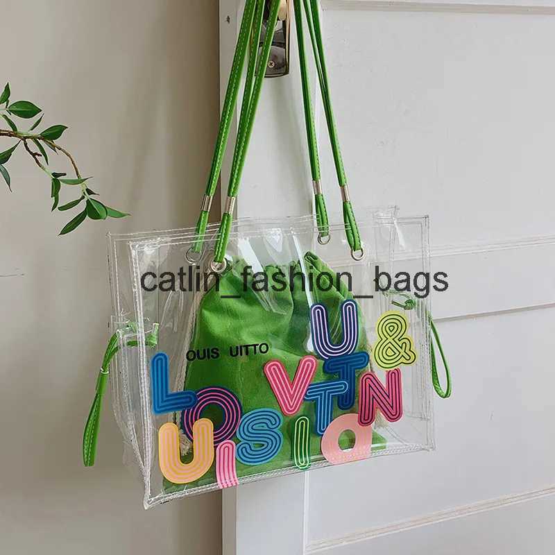 Shoulder Bags Summer large capacity transparent womens shoulder bag with fashionable letter printed PVC womens handbagcaitlin_fashion_bags H240617
