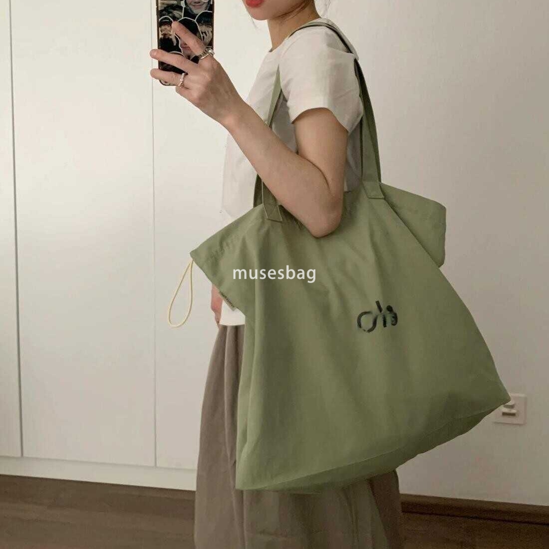 Korean women's high-quality and fashionable large looking tote bag with a lazy style and simple drawstring canvas shoulder bag universal bag for 