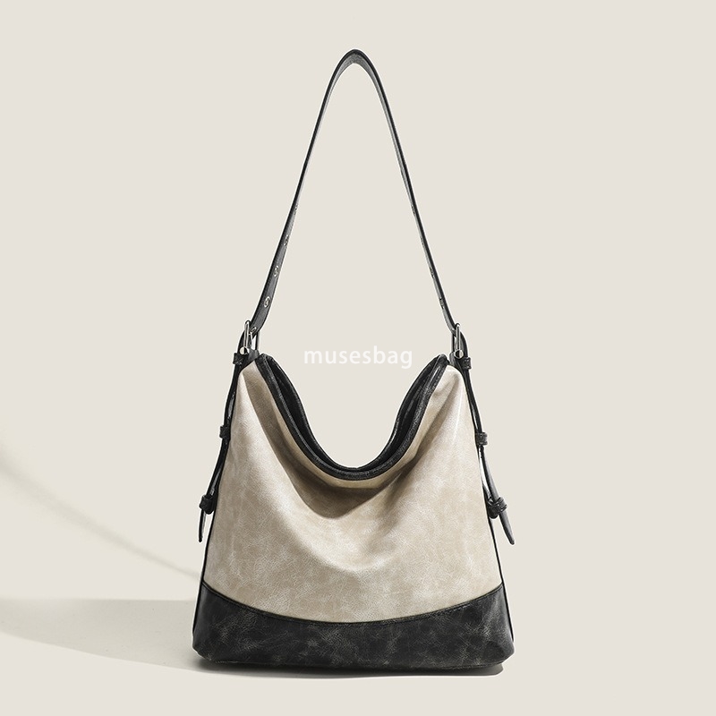 Designer women's high-quality niche retro simple and lightweight versatile fashion trend casual commuting large capacity single shoulder crossbod