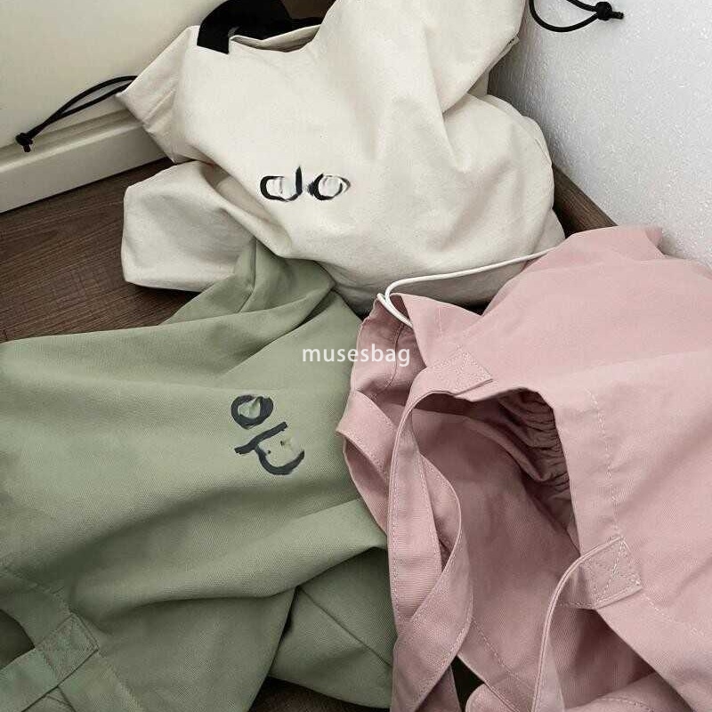Korean women's high-quality and fashionable large looking tote bag with a lazy style and simple drawstring canvas shoulder bag universal bag for 