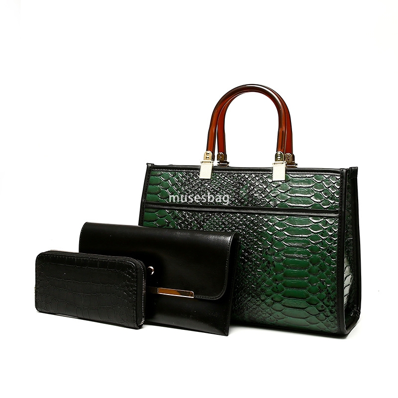 High quality women designer temperament fashionable retro versatile large capacity snake skin pattern niche handbag single shoulder set mother and chi