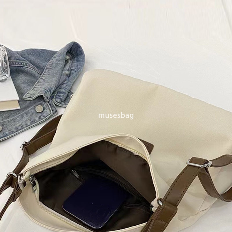 Street trend niche design spring and summer new canvas tote bag multifunctional single shoulder crossbody bag popular contrasting color women's b