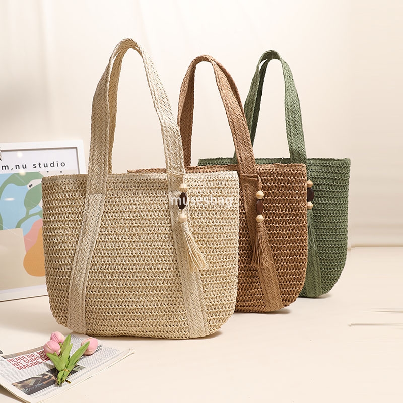 High quality women's designer woven solid color versatile large capacity practical lightweight one shoulder grass woven bag vacation beach bag ve