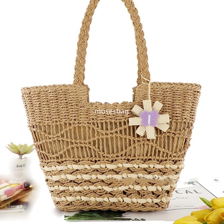High quality women's designer simple and versatile butterfly flower pendant paper rope woven bag single shoulder grass woven bag leisure bag beac