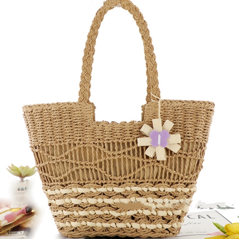 High quality women's designer simple and versatile butterfly flower pendant paper rope woven bag single shoulder grass woven bag leisure bag beac