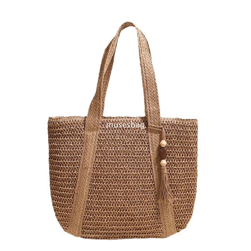 High quality women's designer woven solid color versatile large capacity practical lightweight one shoulder grass woven bag vacation beach bag ve
