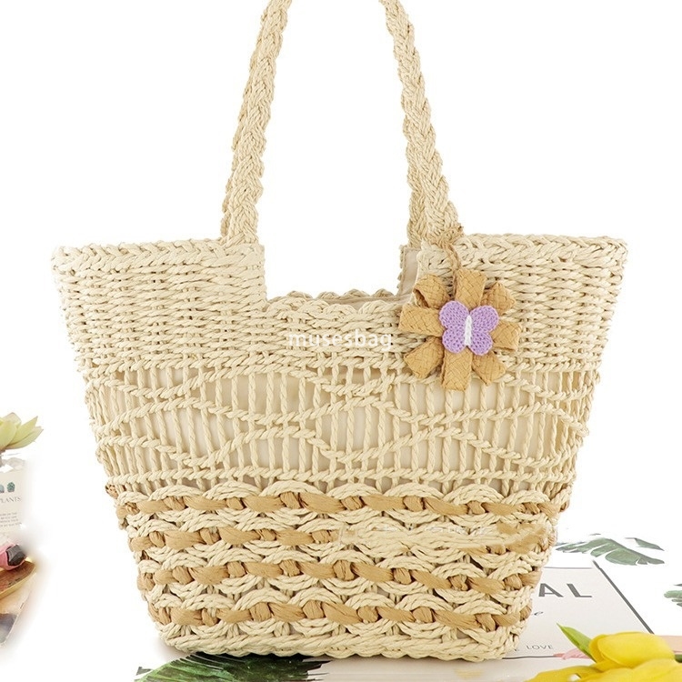 High quality women's designer simple and versatile butterfly flower pendant paper rope woven bag single shoulder grass woven bag leisure bag beac