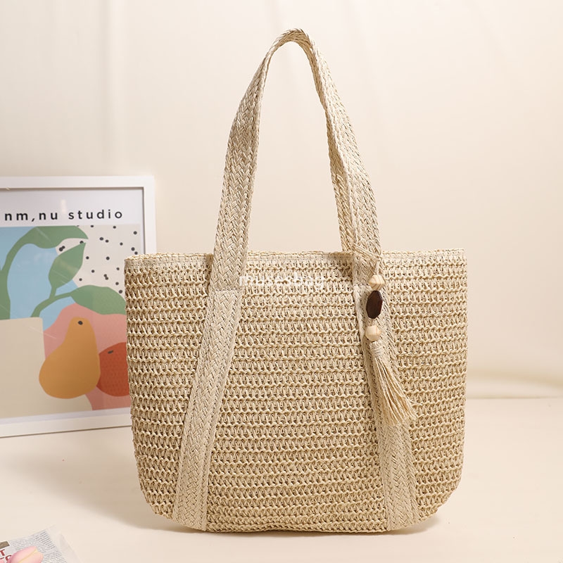 High quality women's designer woven solid color versatile large capacity practical lightweight one shoulder grass woven bag vacation beach bag ve