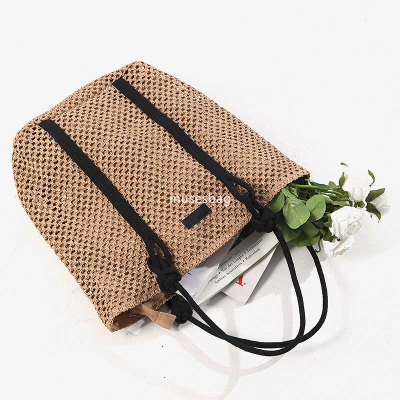 Fashionable women's high-end simple and large capacity single shoulder tote grass woven bag new practical hollow woven bag vacation beach bag ver