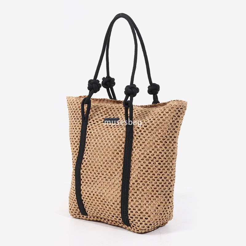 Fashionable women's high-end simple and large capacity single shoulder tote grass woven bag new practical hollow woven bag vacation beach bag ver