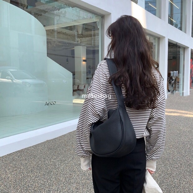Korean version of women's bag for spring and summer new high-capacity Instagram soft leather handbag niche single shoulder bag wide shoulder dail
